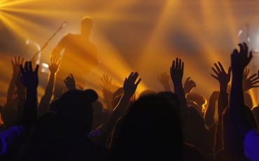 Congregation worshipping during Sunday service at Fellowship Baptist Church